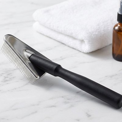 brosse chat poil longâ noir triangulaire