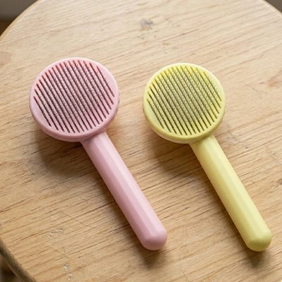 brosse pour chat compacte rose jaune