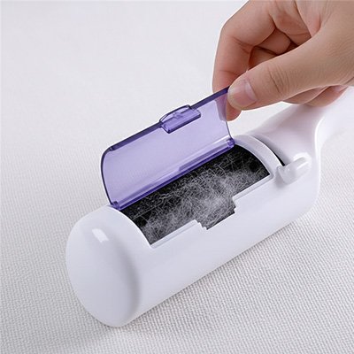 brosse anti poil balayeuse compartiment ouvert
