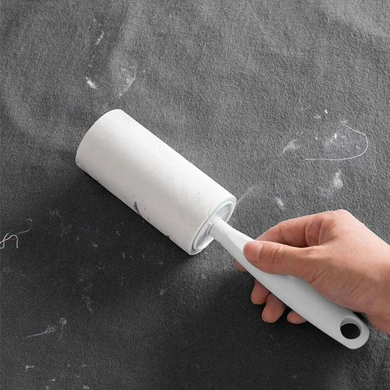 brosse anti poil rouleau a peluches blanc tissu gris