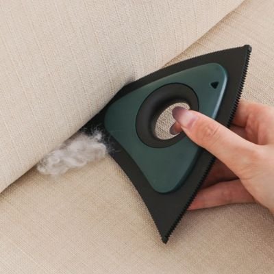 brosse anti poil triangulaire vert canape
