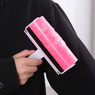 brosse anti poils reutilisable rose vetement