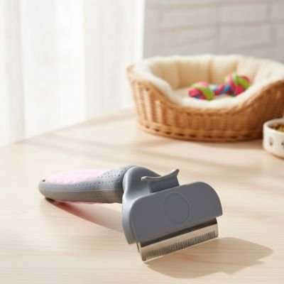 brosse pour chat dents metalliques fines rose