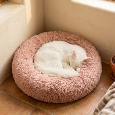 coussin pour chat enveloppant rose chat dormant