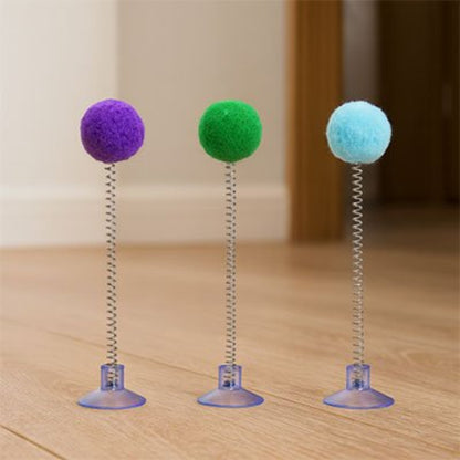 jeu chat pompon ressort violet vert bleu clair