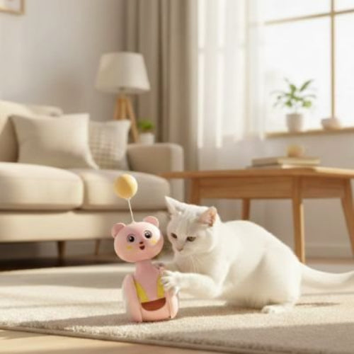 jouet chat culbuto rose avec balle chat jouant salon