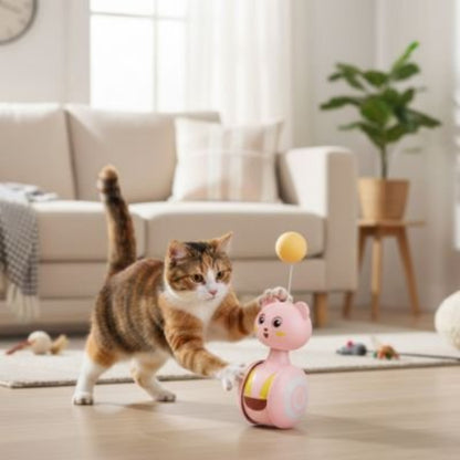 jouet chat culbuto rose avec balle chat sautant salon