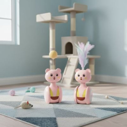 jouet chat culbuto rose avec balle et plume