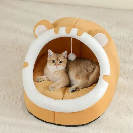 lit pour chat tete de lion jaune chat allonge