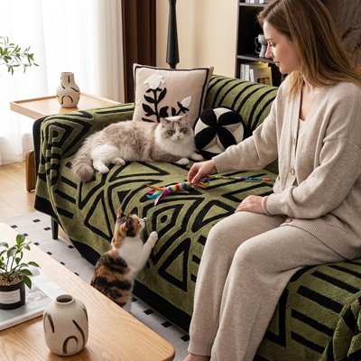 protection canapé chat motifs geometriques vert olive chats maitresse