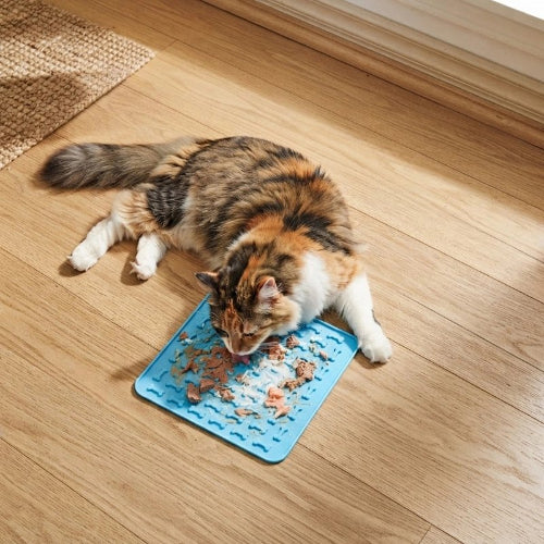 tapis de lechage motifs relief bleu chat allonge