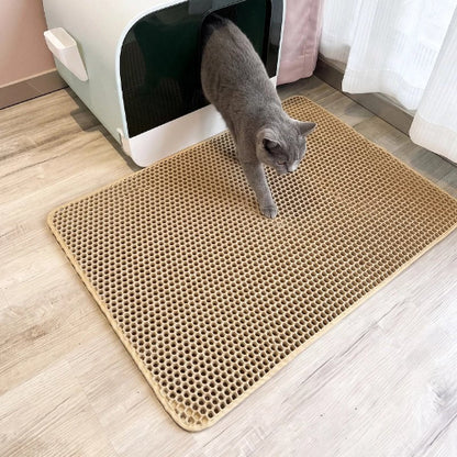 tapis litière chat jaune chat sortant